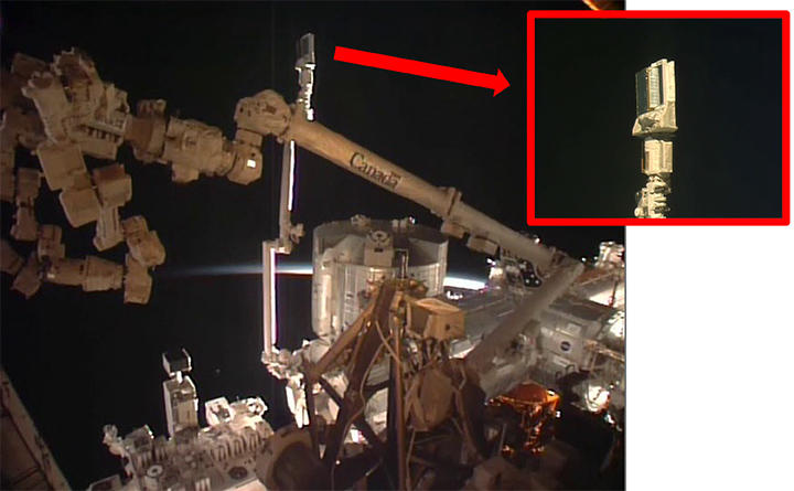 The apparatus as grappled by the JEMRMS at the JEM External Facility