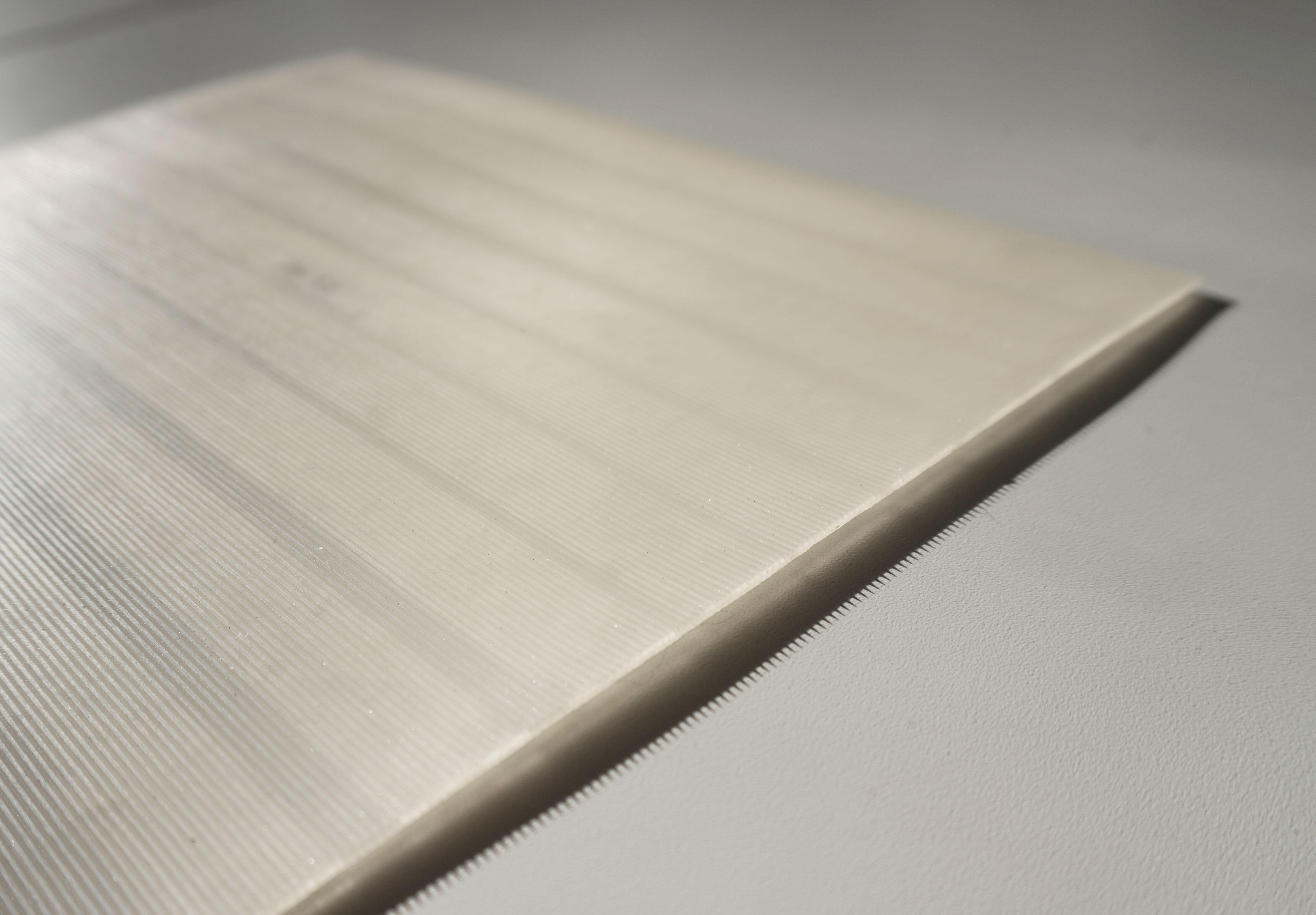 Enlarged sample of riblets (the shaded areas show that the sheet is grooved)