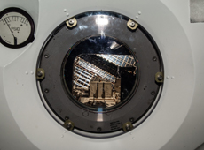 J-SSOD system inside Kibo&rsquo;s airlock. The outside hatch of the airlock is open, and the satellite case is being transferred into the space environment. (courtesy: JAXA/NASA)