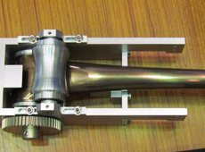 Robotic arm with a tape-measure-like structure