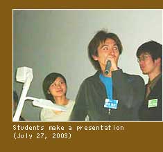 Students make a presentation (July 27, 2003) Photo