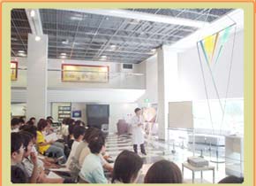 Dr. Nakamura giving a lecture at a summer school