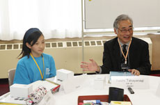 Mr. Takayanagi talking with children during a branch meeting (Courtesy of Young Astronauts Club - Japan)