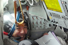 Training in the Soyuz spacecraft simulator. (courtesy of JAXA/GCTC)