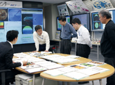 Forecast meeting at the NICT Space Weather Forecast Center (courtesy: NICT)