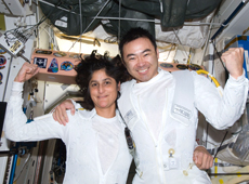 Astronauts Hoshide and Williams after completing the installation of a spare MBSU (courtesy: JAXA/NASA)