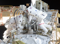 Astronaut Akihiko Hoshide (left) performing his third spacewalk, with Sunita Williams (courtesy: JAXA/NASA)