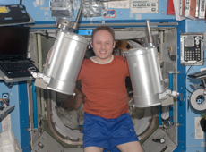 Astronaut Fincke working in the U.S. Destiny Laboratory (Courtesy of NASA)