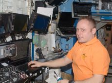 Astronaut Fincke working in the U.S. Destiny Laboratory (Courtesy of NASA) 