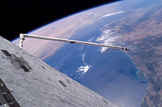 Orbiter Boom Sensor System checking for damage on the Space Shuttle (courtesy: NASA)