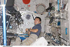 Wakata working in Kibo’s Pressurized Module (courtesy: JAXA/NASA)