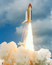STS-114 launch. A piece of insulation fell off of the Space Shuttle’s external fuel tank afterwards. (courtesy: NASA)