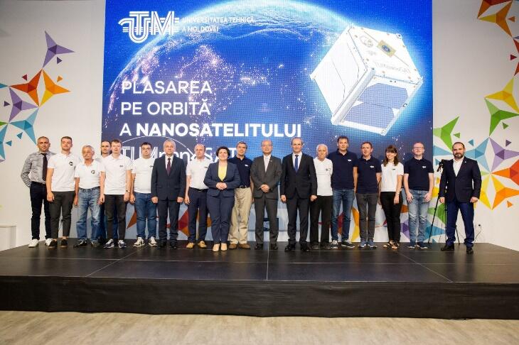 Group photo celebrating the successful deployment of TUMnanoSAT