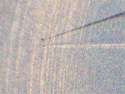 Particles captured on asteroid Itokawa on exhibition.