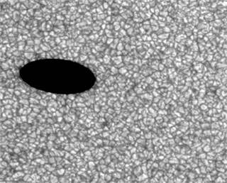 HINODE captured the transit of Mercury across the Sun